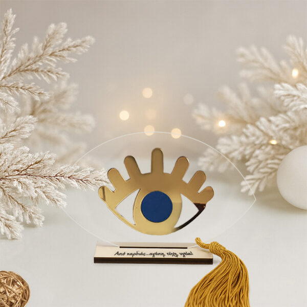 Γούρι μάτι βλεφαρίδες μπλε με βάση σε διάφανο plexiglass